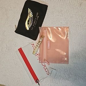 All Brand new makeup bags and huda lip gloss